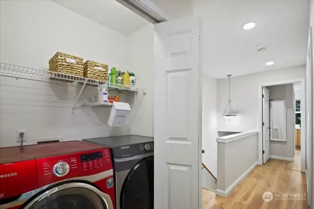 Upstairs hall with washer and dryer units