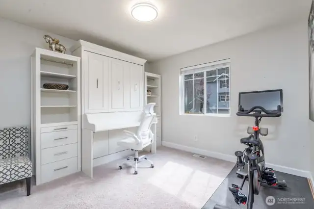 4th bedroom with built-in desk with Murphy bed