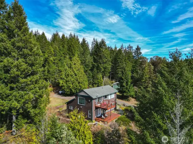 Perched on 6.6 ac with Hood Canal/Mt views
