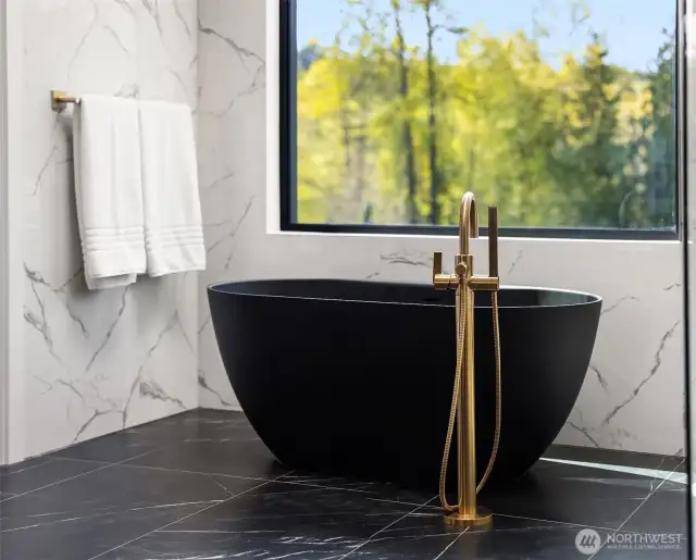 Photo of adjacent, completed home (lot 3) Primary bathroom tub  - for representation purposes only.
