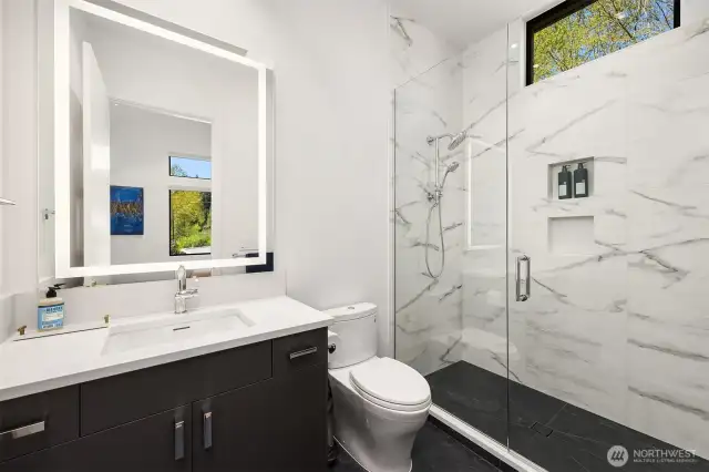 Photo of adjacent, completed home (lot 3) Ensuite guest bath - for representation purposes only.