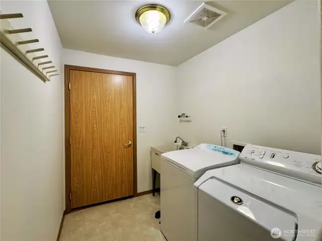 Laundry room, door leads out to the garage
