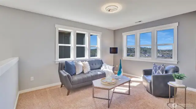 Enjoy stunning city views from this versatile loft space, bathed in natural light and offering the perfect blend of comfort and style. Whether used as a cozy retreat, an additional living area, or a creative studio, this loft provides an open, airy atmosphere with panoramic views that make every moment inspiring.