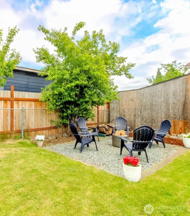 Backyard firepit area perfect for entertaining or a relaxing night-in!