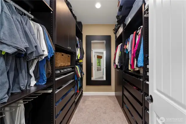 Walk-in closet w/custom built-in organization.