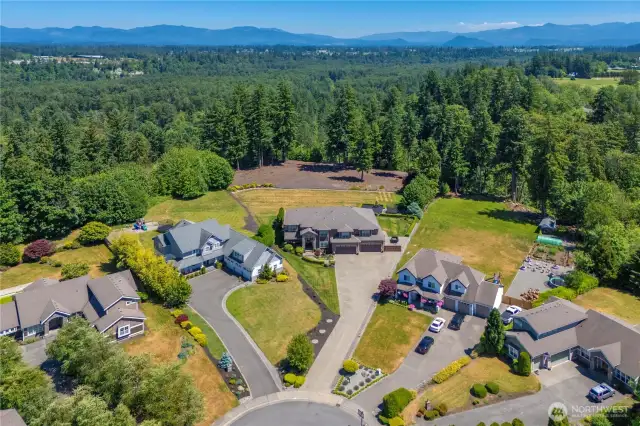 Spacious 1.94 acre lot in cul-de-sac w/greenbelt & Cascade views.