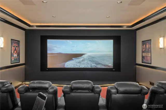 This is a legit theater room!  160" Stewart filmscreen side masking w/Runco projector.