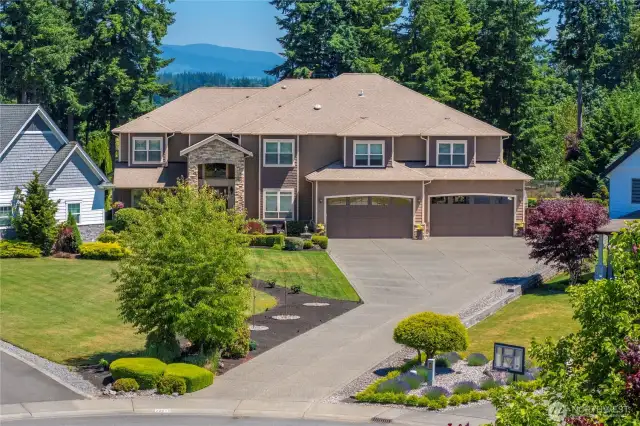 Giant 1,773 sqft garage w/shop & 1/2 bath. Foothill views. A/C, heat pump, 20 zone sprinkler system, security system w/cameras.