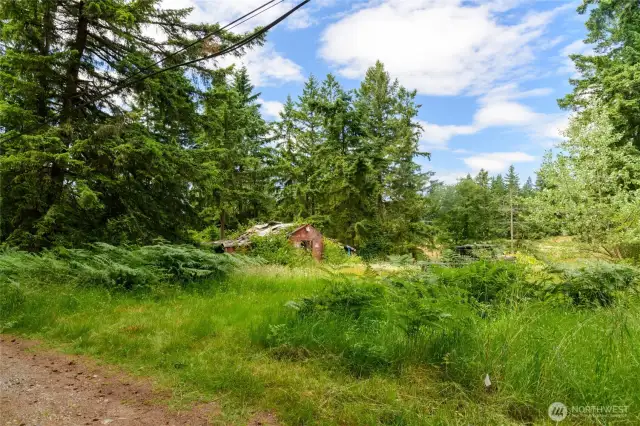 Perfect location for your custom home-nice, level building area at top of lot leading down a gentle slope to the lower half of the property which is also level.