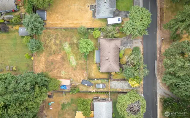 Located behind home listed for sale: (MLS#: 2395913). This lot is 8,187 sqft!