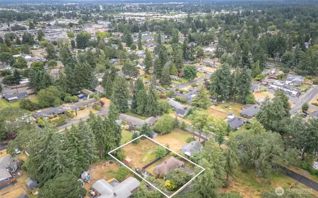 This is a shot of BOTH the vacant land lot AND the single family home for sale