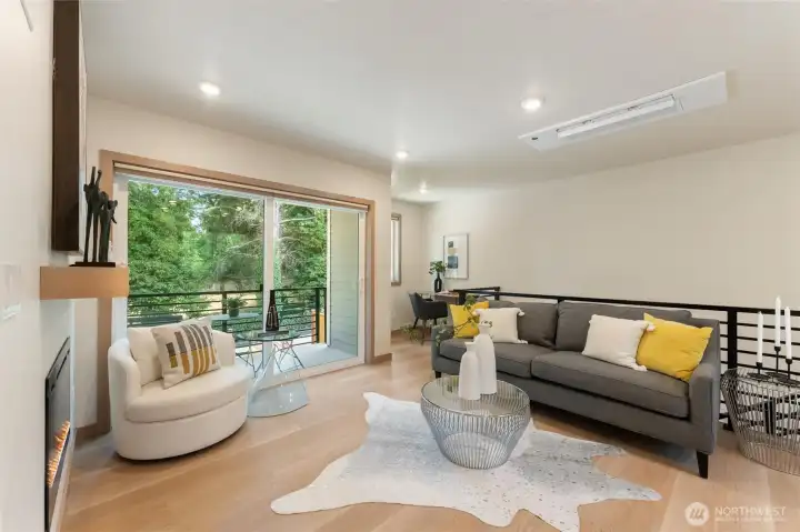 Luxury final plank flooring and wood wrapped windows add quality touches.