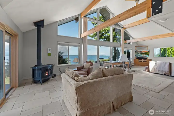 Recently installed wood stove and radiant heated tile flooring in the great room.