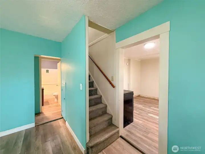 Kitchen of Dining. Stairs Lead to 4th Bedroom.