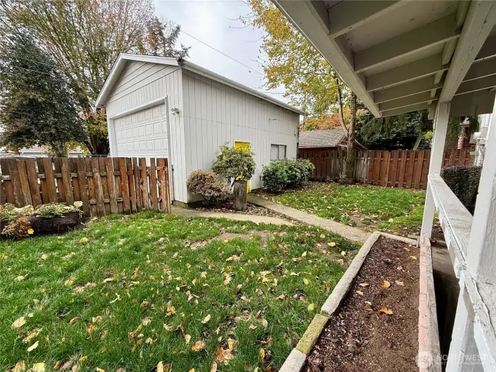 Fenced Backyard with Shop Access