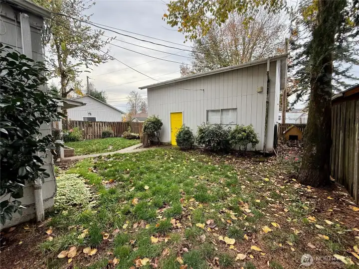 Fenced Backyard with Dog Run.