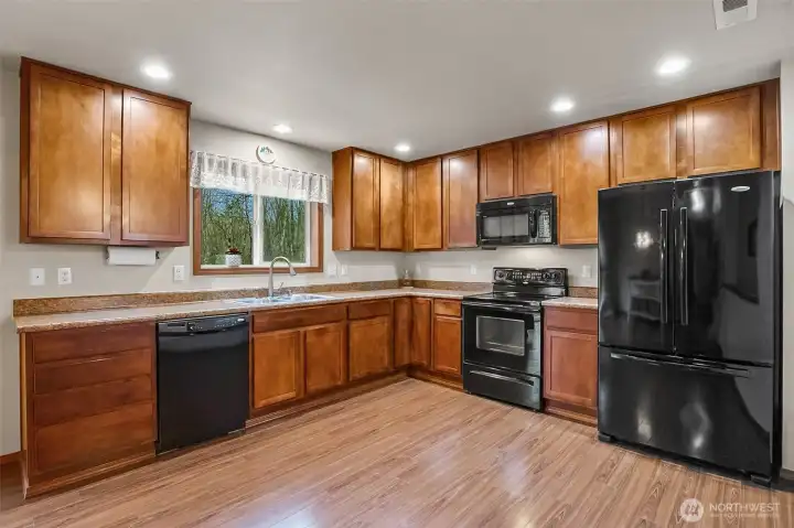 Spacious kitchen and dining area.