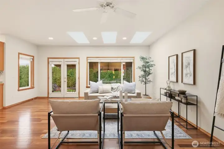 Great room leads to covered back patio.