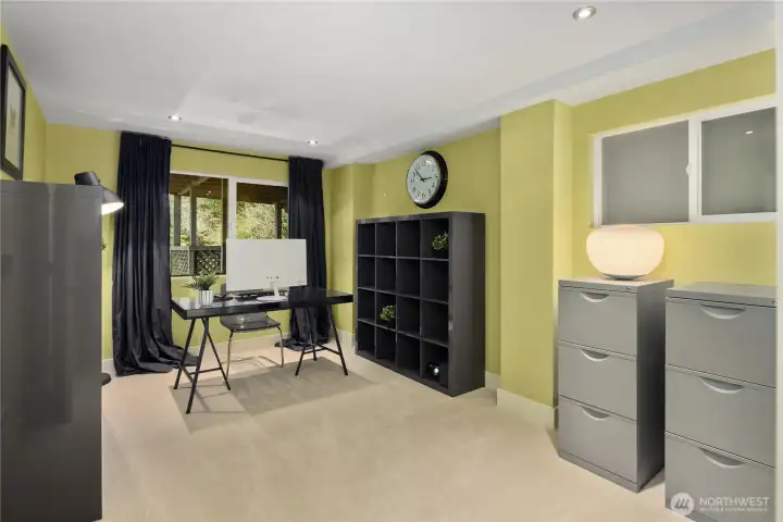 Secluded third bedroom offers versatility as an office, nursery, or flex space