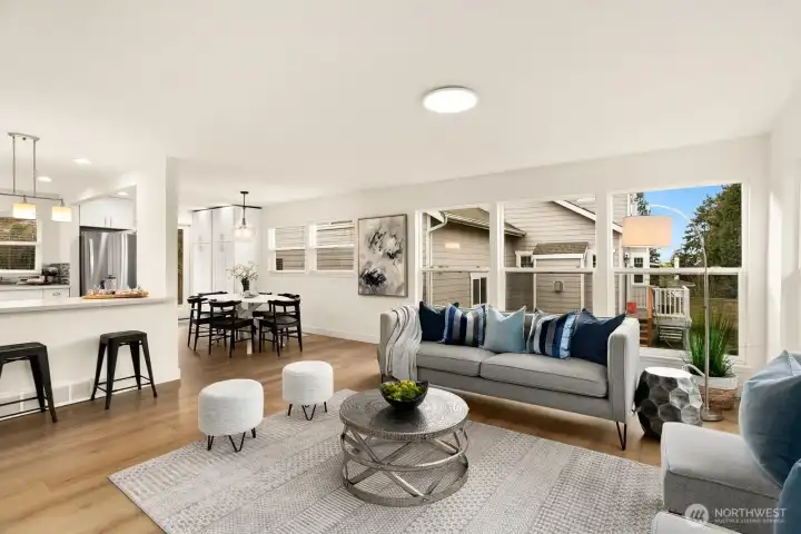 Another view of the living room looking towards the kitchen and dining area.
