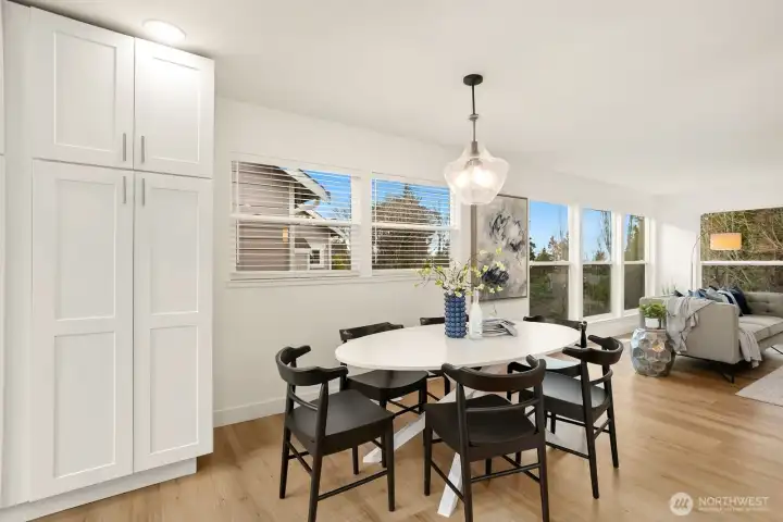 A close up of the dining space and pantry.