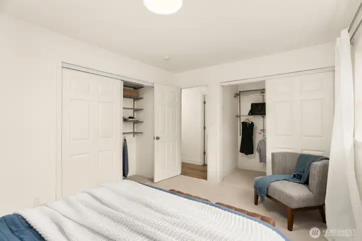 The primary bedroom has 2 closets - the one on the right is a walk-in closet.