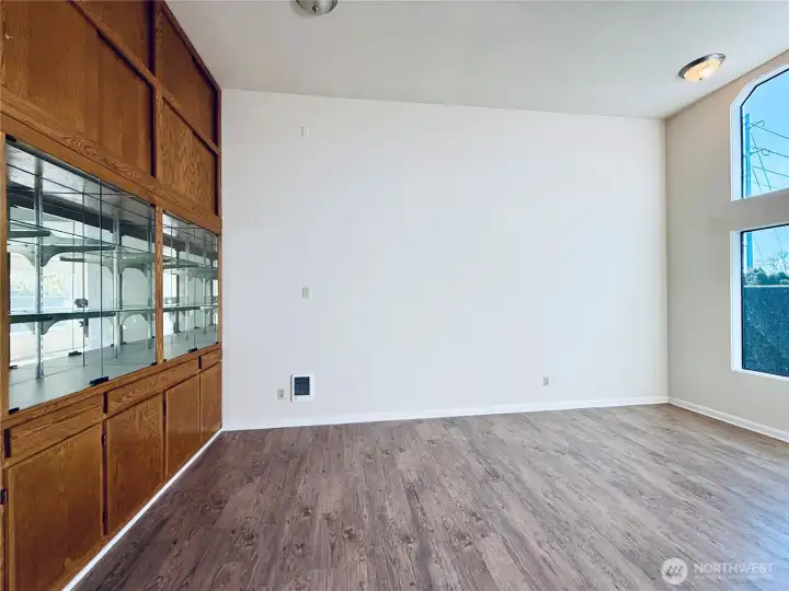 Built in lighted cabinets provides storage with function