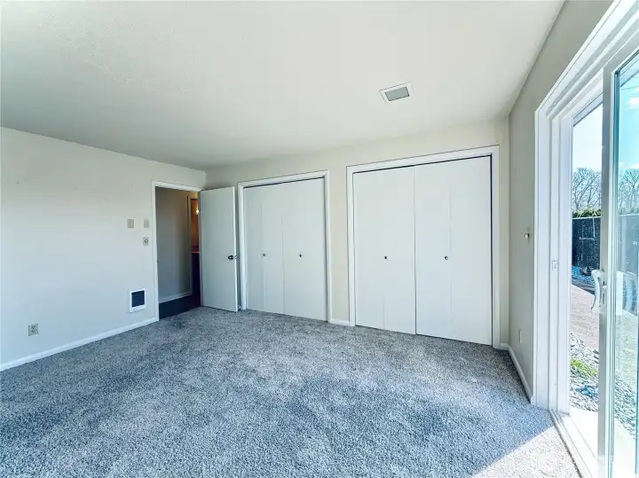 Second bedroom with it's own slider to the enclosed patio