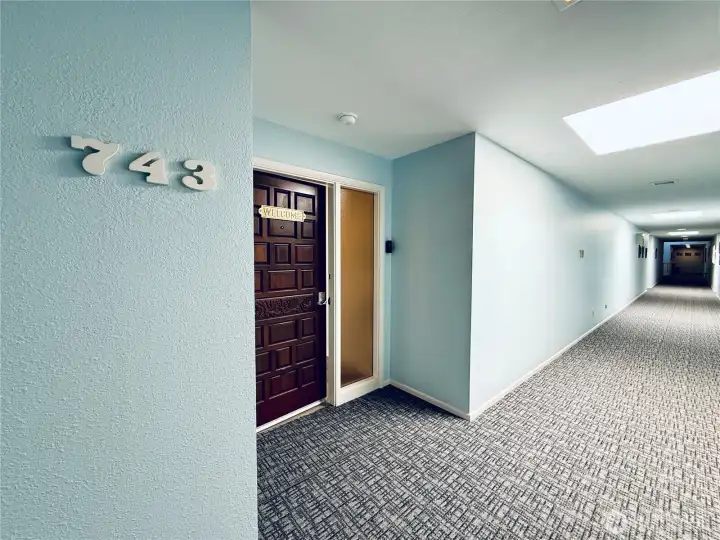 Inside entry to home, this condo has a keyed entry with intercom