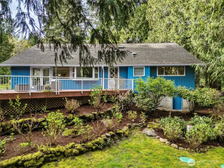 In the heart of Mirrormont—one of South Issaquah’s most coveted and character-rich communities—this beautifully refreshed home unfolds as more than just a place to live. It is a retreat, a daily exhale, a setting where life slows just enough to be fully experienced. Tucked among towering evergreens and surrounded by the quiet presence of nature, yet only minutes—approximately 13—from the charm and vibrancy of downtown Issaquah, this approx. 3,000 square foot residence offers the rare combination of privacy, space, and thoughtful updates that today’s lifestyle demands.