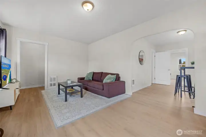 Main living area with new flooring and paint