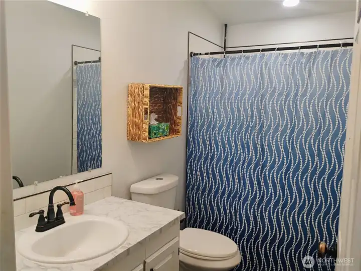 Guest Bathroom located near bedrooms 2 and 3