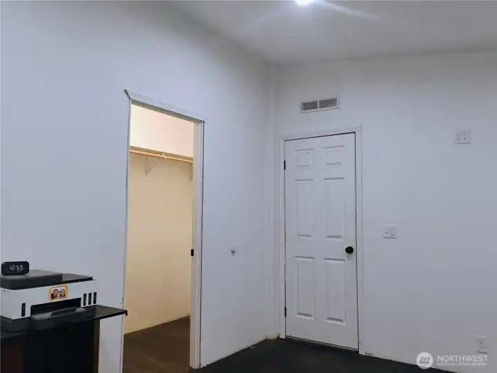 Walk in closet two people can comfortably share