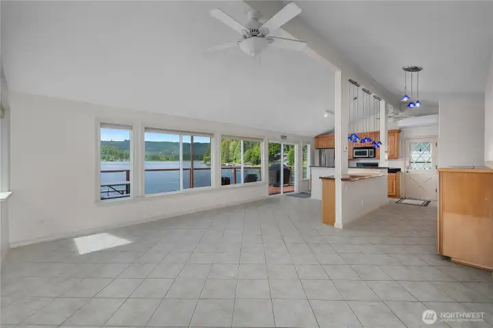 Gather in the open main living space where wide windows bring Summit Lake into the room. Gather in the open main living space where wide windows bring Summit Lake into the room.