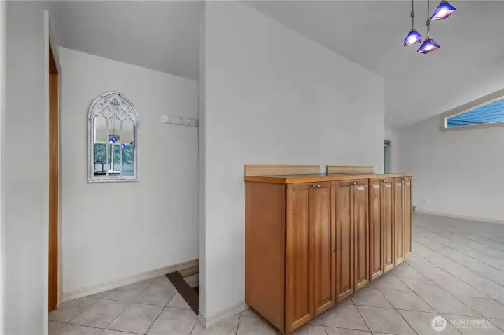 Use the built-ins for storage, serving, or display in this flexible main-level space. Use the built-ins for storage, serving, or display in this flexible main-level space.