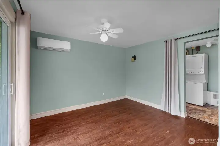 Primary BR - Relax in a comfortable lake-view space with efficient climate control and nearby laundry. Primary BR - Relax in a comfortable lake-view space with efficient climate control and nearby laundry.