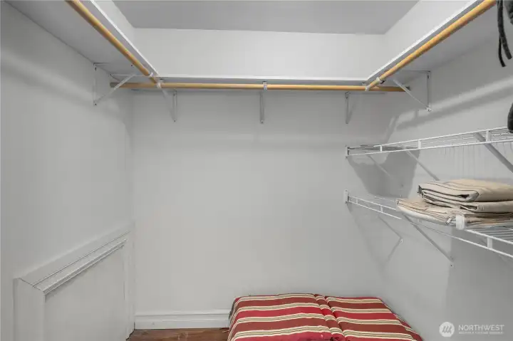 Primary Walk-in closet provides practical hanging space and shelving for everyday storage. Primary Walk-in closet provides practical hanging space and shelving for everyday storage.