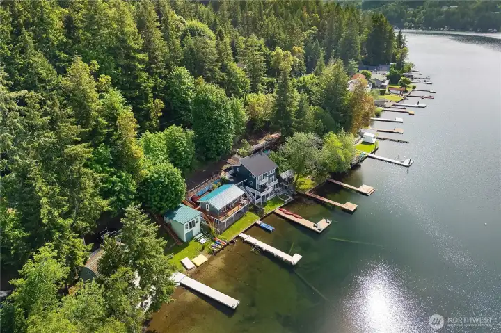 Picture summer days on the dock, lawn, and water from this complete aerial view. Picture summer days on the dock, lawn, and water from this complete aerial view.