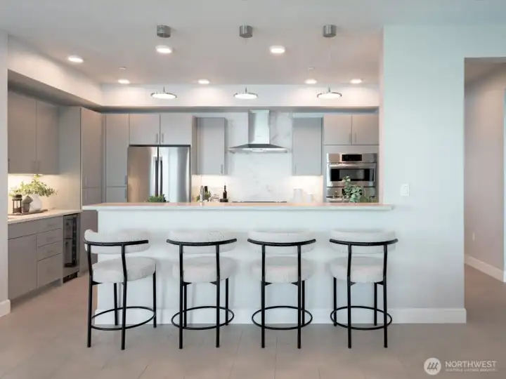 The built-in breakfast bar provides extra seating and an informal eating space for you. The built-in breakfast bar provides extra seating and an informal eating space for you.