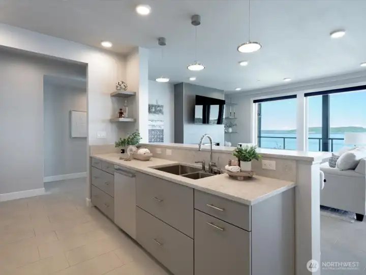 A generous island provides ample workspace, storage, and seating while remaining connected to the living and dining areas. A generous island provides ample workspace, storage, and seating while remaining connected to the living and dining areas.