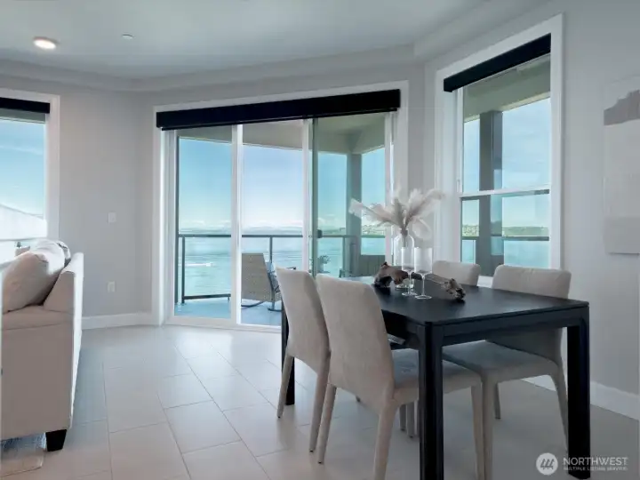 Dine with a view in the dedicated dining space, perfectly positioned between the kitchen and waterfront deck. Beats any restaurant in the area! Dine with a view in the dedicated dining space, perfectly positioned between the kitchen and waterfront deck. Beats any restaurant in the area!
