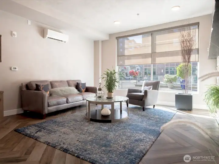 Settle into this inviting seating area just off the main lobby. An ideal place to enjoy your favorite book, catch up on the day's headlines, or connect with neighbors in a relaxed and welcoming setting. Settle into this inviting seating area just off the main lobby. An ideal place to enjoy your favorite book, catch up on the day's headlines, or connect with neighbors in a relaxed and welcoming setting.
