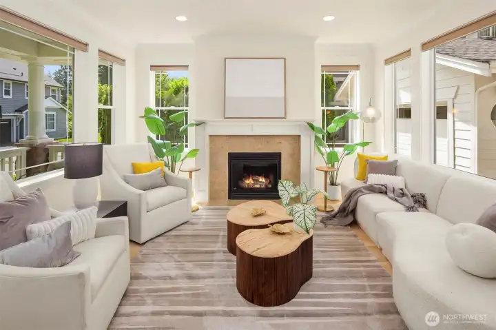 Formal living room opposite office with gas fireplace and windows on three sides making it a great space for natural light. Formal living room opposite office with gas fireplace and windows on three sides making it a great space for natural light.