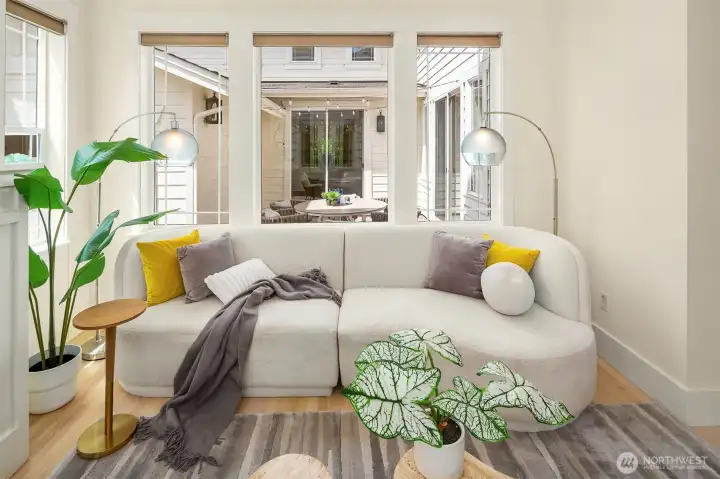 Formal living with courtyard in background. Formal living with courtyard in background.