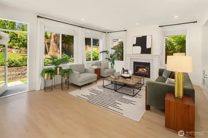 Living room is perfectly situated with west facing windows making it the perfect spot to enjoy the natural light in the afternoons and early evenings. Living room is perfectly situated with west facing windows making it the perfect spot to enjoy the natural light in the afternoons and early evenings.