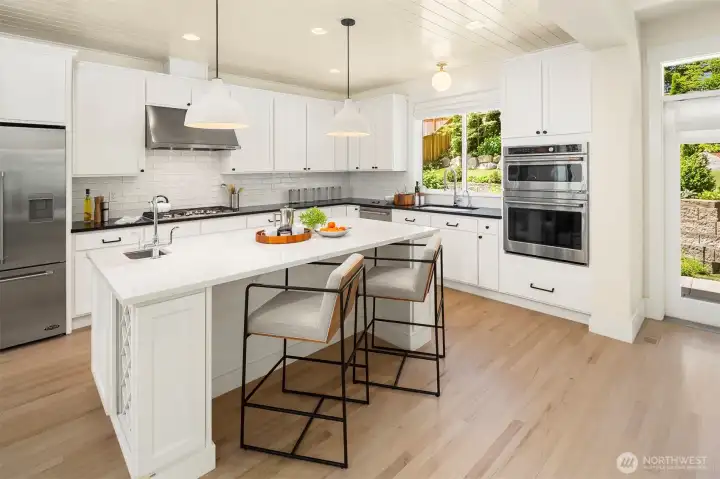 Chef's kitchen with island. Chef's kitchen with island.