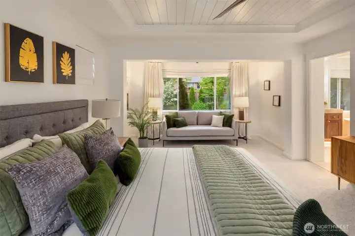 Spacious primary suite features sitting area and great natural light in morning and evenings. Spacious primary suite features sitting area and great natural light in morning and evenings.