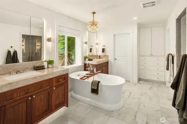 Huge primary bathrooms with two separate vanities, under cabinet lighting, steam shower, built-in drawers/cabinets, plus two walk closets. Huge primary bathrooms with two separate vanities, under cabinet lighting, steam shower, built-in drawers/cabinets, plus two walk closets.