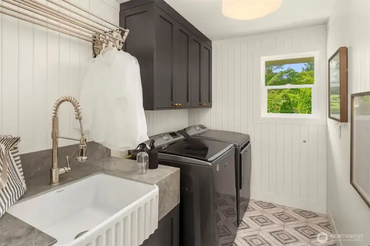 Laundry room with farmhouse style sink. Laundry room with farmhouse style sink.