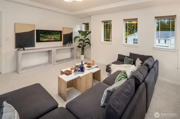 Media or recreation room has windows on three sides providing an abundance of natural light. Media or recreation room has windows on three sides providing an abundance of natural light.